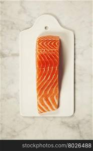 fresh raw salmon fillet on white background