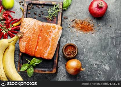 Fresh raw salmon fillet with cooking ingredients. Fresh raw salmon fish