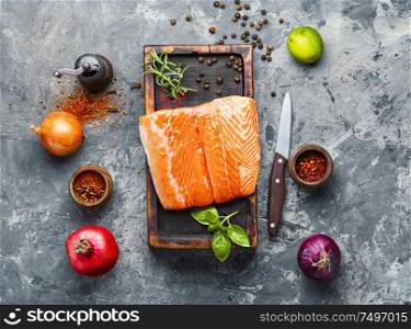 Fresh raw salmon fillet with cooking ingredients. Fresh raw salmon fish