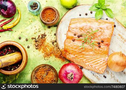 Fresh raw salmon fillet with cooking ingredients.Seafood. Fresh raw salmon fish