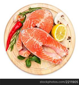 Fresh Raw Salmon Red Fish Steak isolated on cutting board. Fresh Raw Salmon Red Fish Steak