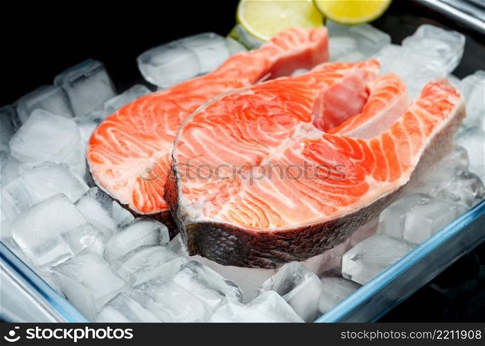 Fresh Raw Salmon Red Fish Steak isolated on ice. Fresh Raw Salmon Red Fish Steak
