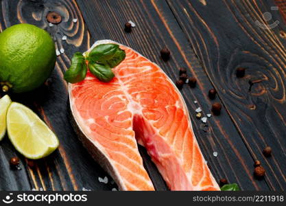 Fresh Raw Salmon Red Fish Steak on wooden background. Fresh Raw Salmon Red Fish Steak