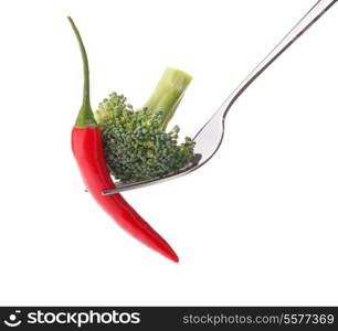 Fresh raw vegetables on fork isolated on white background cutout. Healthy eating concept.