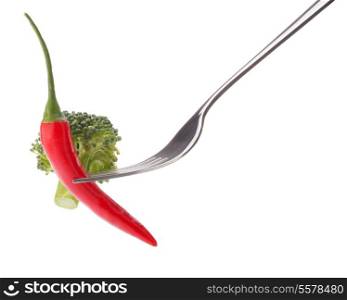 Fresh raw vegetables on fork isolated on white background cutout. Healthy eating concept.