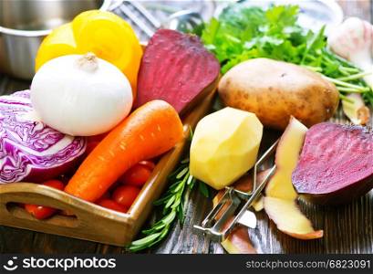 fresh raw vegetables on the wooden table