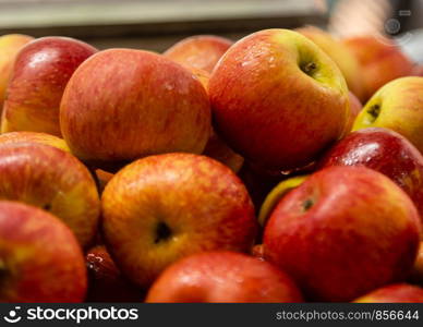 Fresh red and yellow apples at market