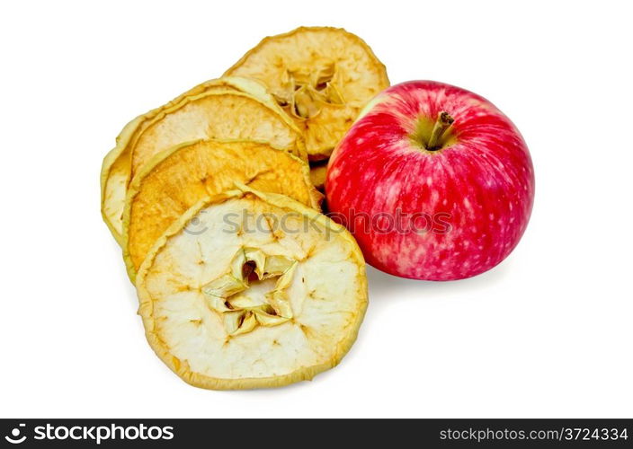 Fresh red apple and dried apple slices isolated on white background