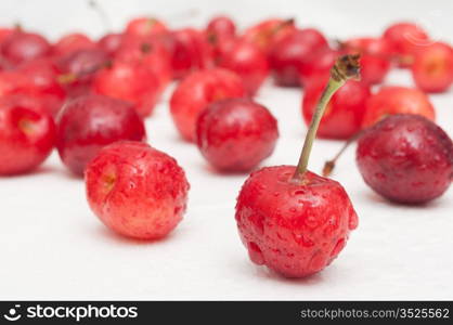 Fresh Red Cherries on White Wooden Table - Shallow Depth of Field