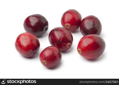 Fresh red cranberries on white background