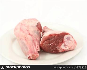 Fresh red meat, chops isolated on white plate