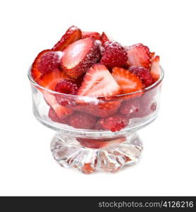 Fresh red raspberries and strawberries in glass dish isolated on white