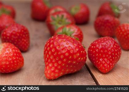 Fresh Red Strawberries on Wooden Background
