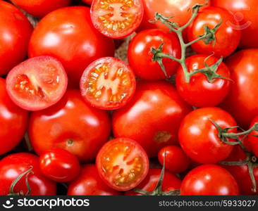 fresh red tomatoes as background