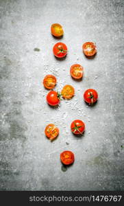 Fresh red tomatoes. On a stone background. . Fresh red tomatoes. On stone background.