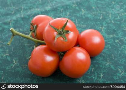Fresh red tomatoes on the kitchen table