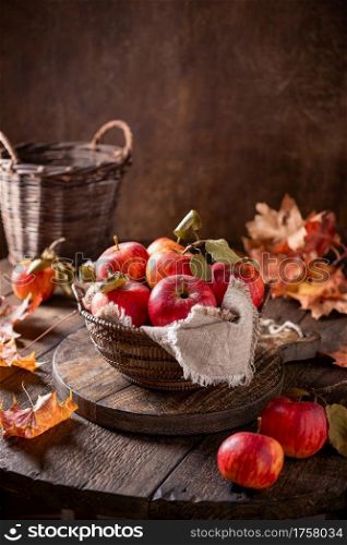 Fresh ripe apples in a basket, with copy space
