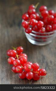 fresh ripe currant on old table wood