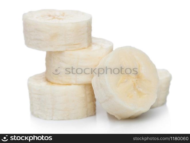 Fresh ripe organic banana sliced pieces on white background.