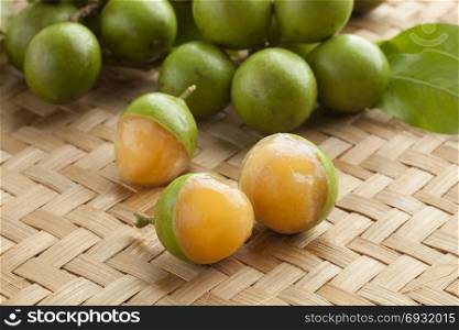 Fresh ripe peeled quenepa fruit