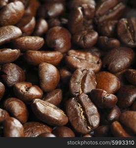 Fresh roasted coffee beans close-up background
