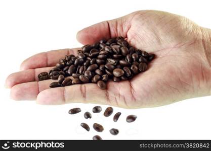 Fresh roasted coffee beans pouring, isolated on white