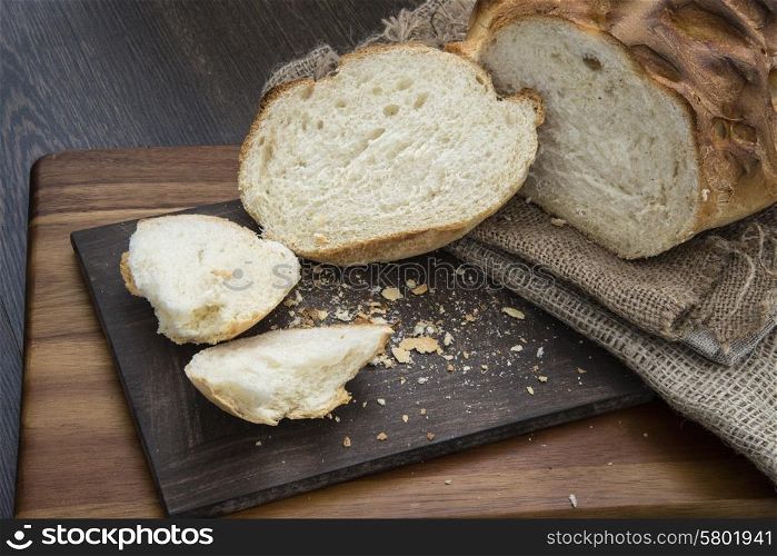 Fresh rustic loaf of bread in farmhouse setting