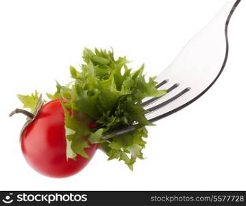 Fresh salad and cherry tomato on fork isolated on white background cutout. Healthy eating concept.
