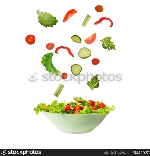 fresh salad components drop to bowl