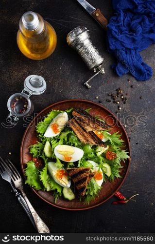 fresh salad, diet food, salad with salmon caviar