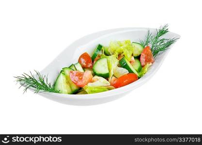 Fresh salad from vegetables on the white
