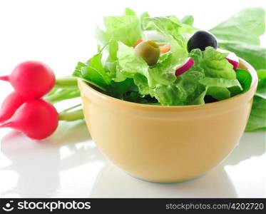 fresh salad in a bowl , close up