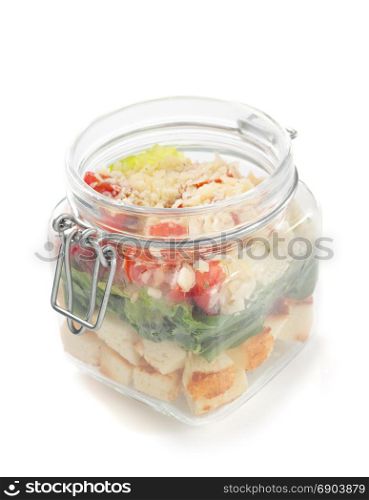 fresh salad in glass jar isolated on white background