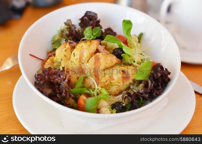 fresh salad of fried chicken and vegetable