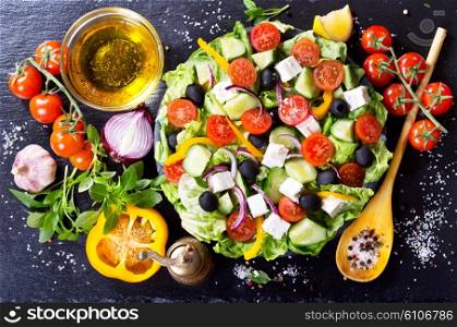 fresh salad on dark board