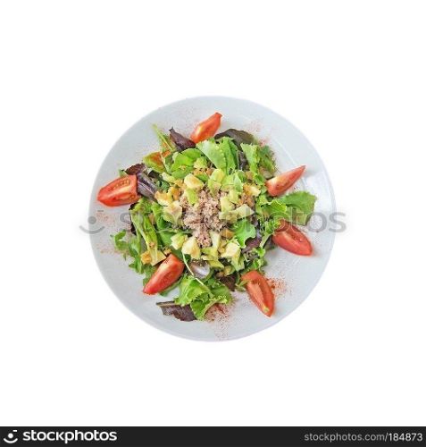 Fresh salad plate with avocado, tuna and tomatoes in Mallorca, Spain. Fresh salad plate with avocado