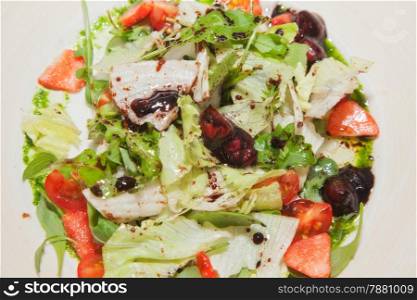 fresh salad with cherry, tomatoes and meat
