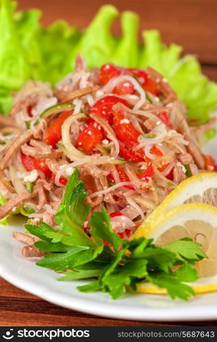 Fresh salad with funchozy, meat and vegetables