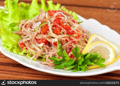 Fresh salad with funchozy, meat and vegetables