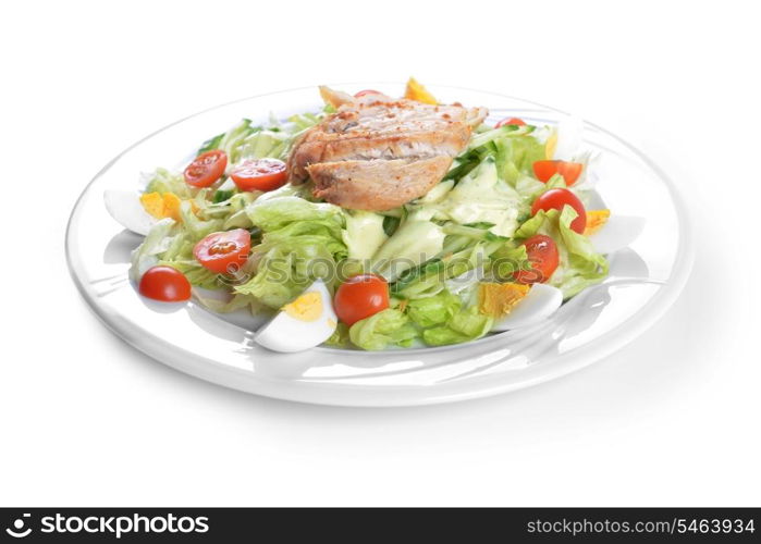 Fresh salad with lettuce, cherry tomato and meat on dish