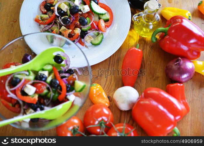 fresh salad with tomato, olives, pepper and other vegetables