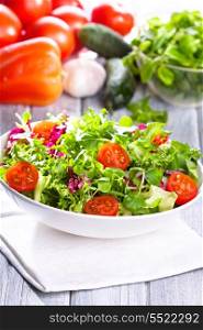 fresh salad with vegetables and greens