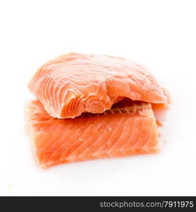 fresh salmon steak over white background