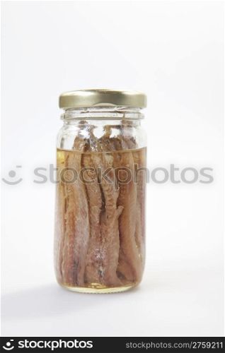 Fresh salty anchoved under oil on white background