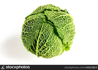 Fresh savoy cabbage isolated on a white background. Savoy cabbage isolated on a white background