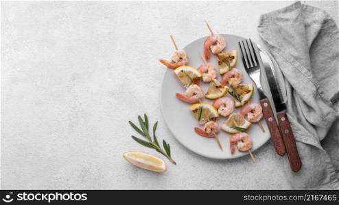 fresh seafood shrimp skewers cutlery