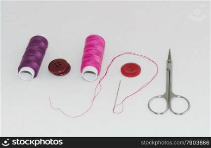 Fresh sewing kit on a white background