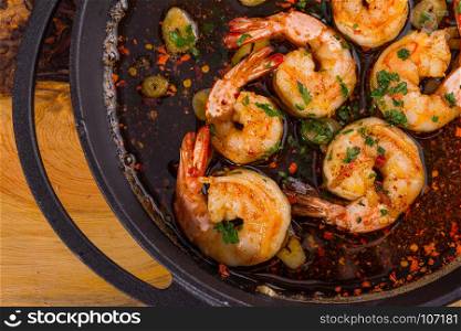 fresh shrimps casserole served with hot spices