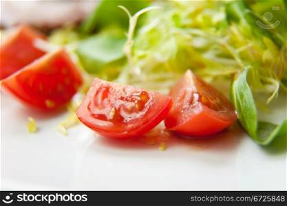 Fresh sliced tomatoes and salad