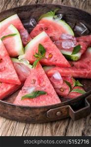 Fresh sliced watermelon. Ripe fresh sliced summer watermelon with ice